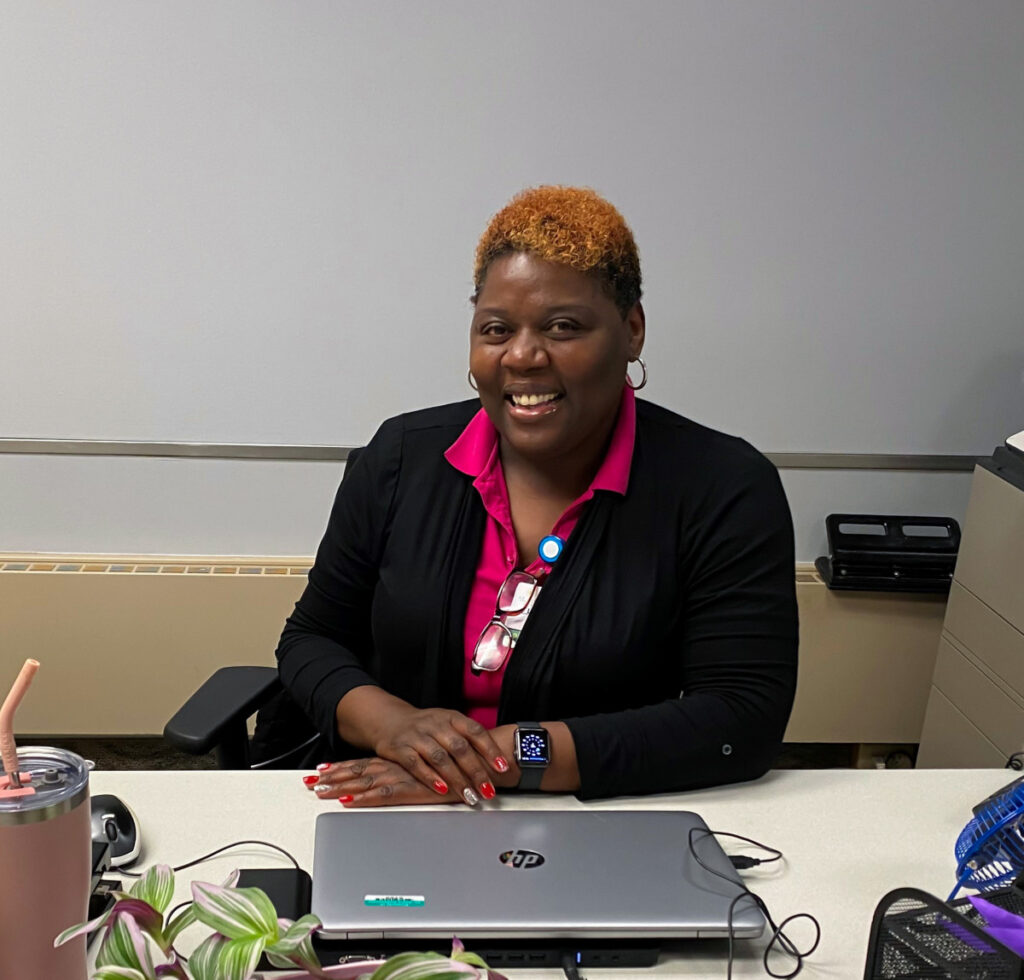 Lisa Giles behind her desk